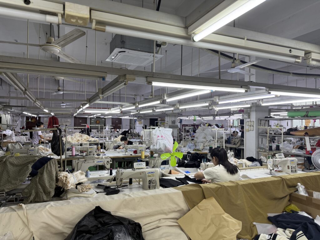 Front entrance of Tetramade apparel factory in Shenzhen with professional signage.
